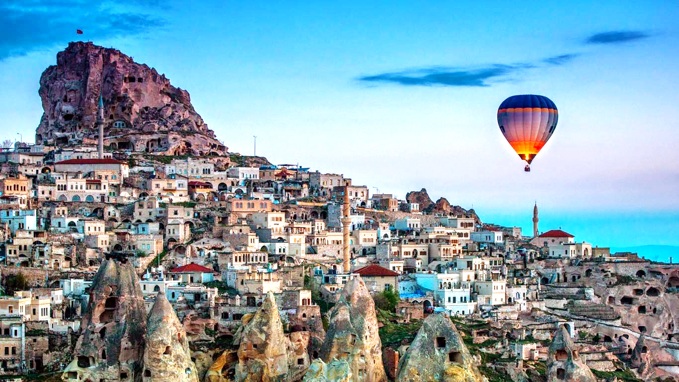 Hot air balloons over Cappadocia, Central Anatolia, Turkey, Asia